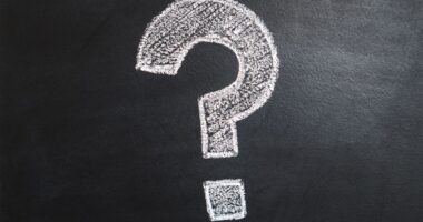 A question mark drawn on a chalkboard, representing an FAQ page rewrite