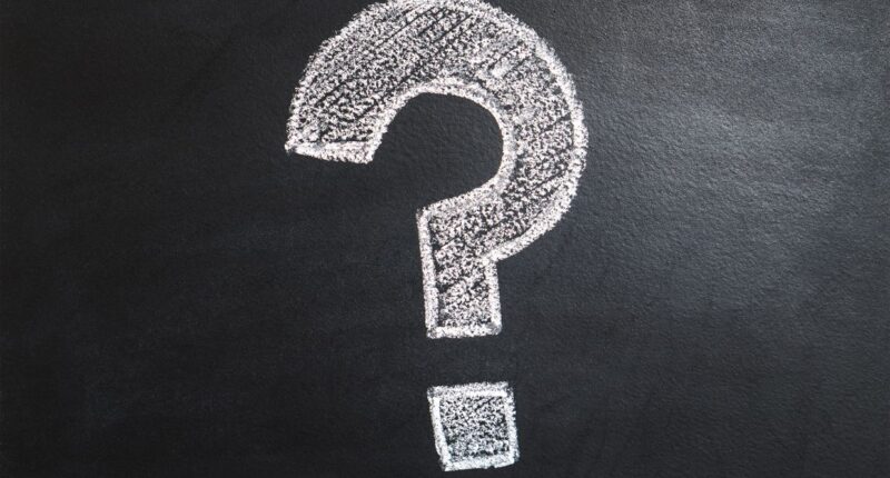 A question mark drawn on a chalkboard, representing an FAQ page rewrite