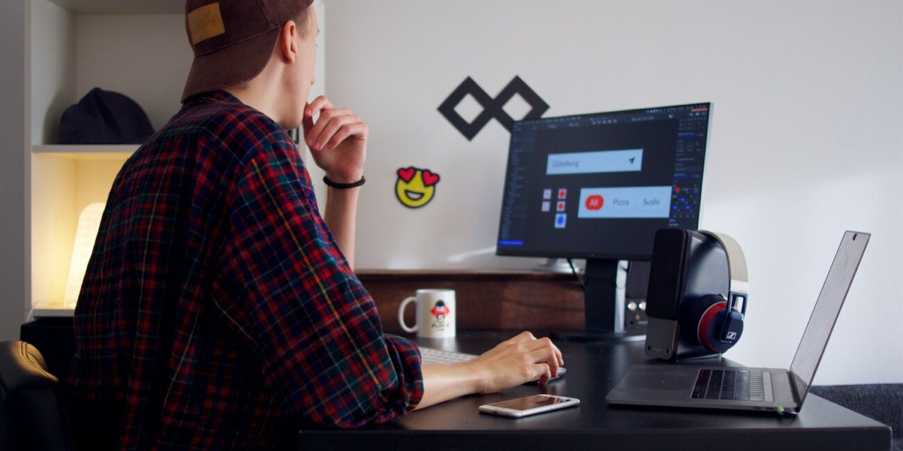 Person working independently at a laptop, representing the freelance-to-founder transition