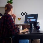 Person working independently at a laptop, representing the freelance-to-founder transition