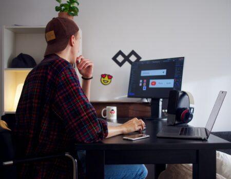 Person working independently at a laptop, representing the freelance-to-founder transition