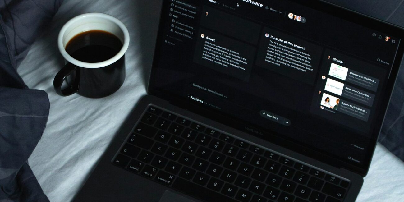 Laptop set up for independent work, representing the shift from employee to entrepreneur
