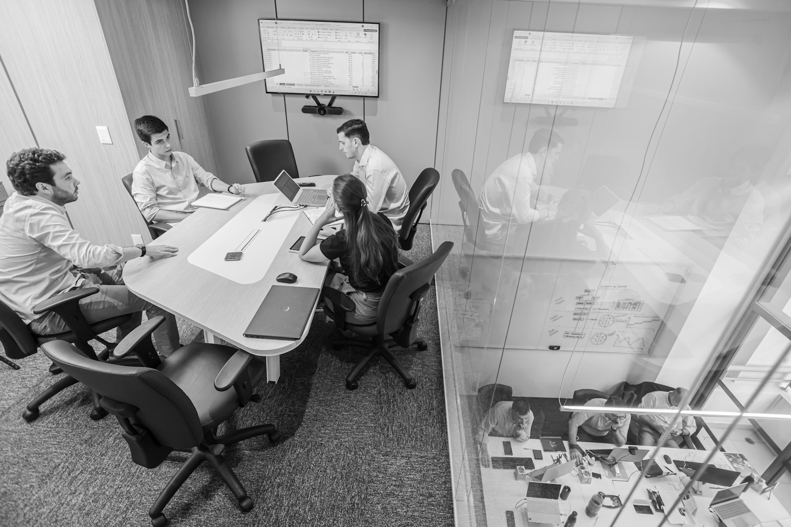 A team meeting in a modern conference room, representing what investors actually look for before the pitch deck